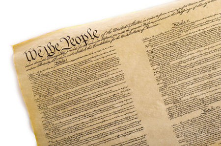 A copy of the United States Constitution on a white backgroundの写真素材