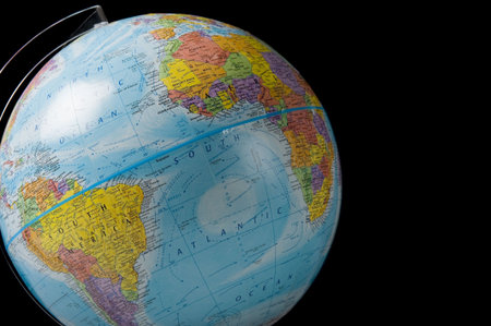 World globe on a black background with copy space