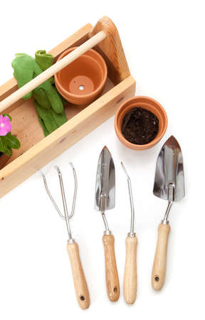 A gardener's tote box on a white background with tools, plants and glovesの写真素材