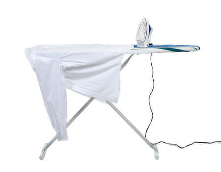 An ironing board with iron and a shirt on a white backgroundの写真素材