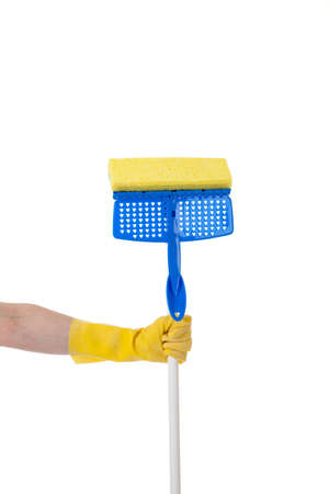A hand holding a household mop on a white backgroundの写真素材