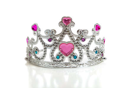 A child's toy princess tiara on a white background with copy spaceの写真素材