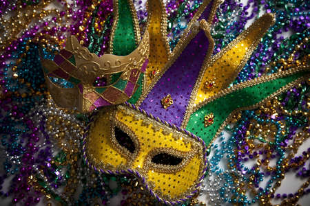 A group of mardi gras beads an mask with copy spaceの写真素材