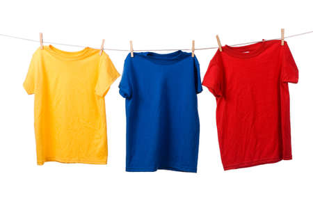 Multi-color t-shirts on a clotheslineの写真素材