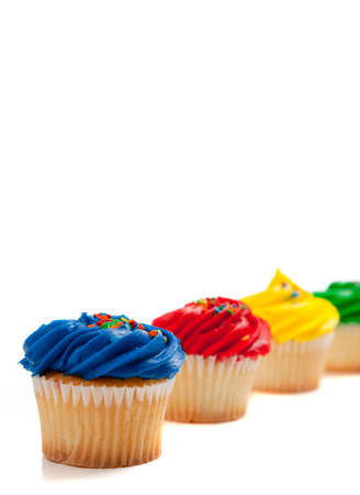 Rainbow color cupcakes ona white backgroundの写真素材