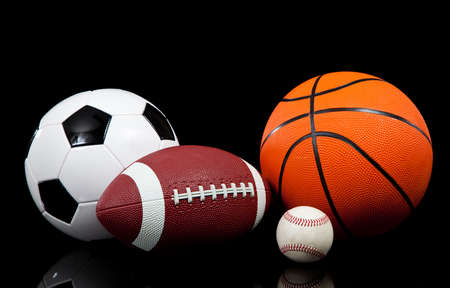 Multi sports balls on a black background Multi sports balls on a black background