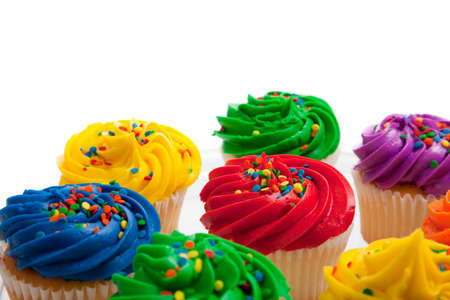 Multi colored cupcakes on white backgroundの写真素材