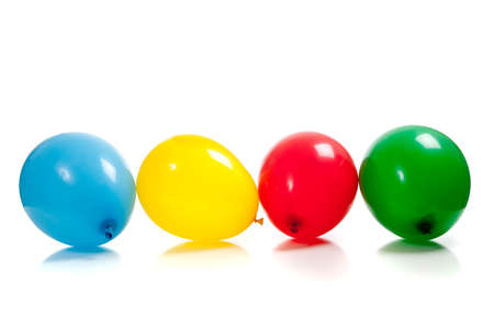 Multi-colored balloons on a white backgroundの写真素材