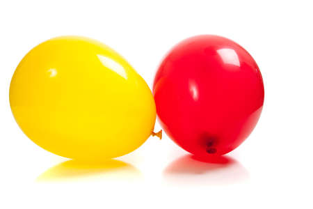 Multi-colored balloons on a white backgroundの写真素材