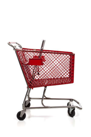 A red shopping cart on whiteの写真素材