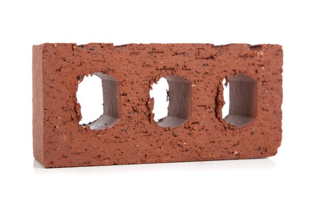 Bricks and a mason's trowel on a white background