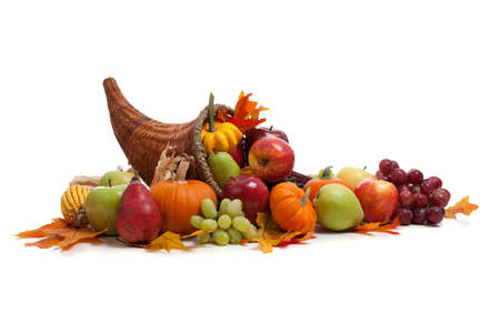 A Fall arrangement in a cornucopia on a white backgroundの写真素材
