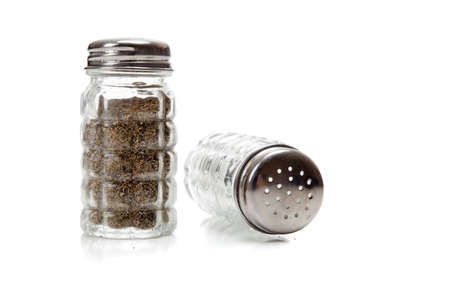 A crystal salt and pepper shaker on a white backgroundの写真素材