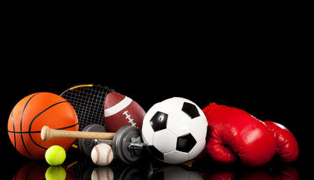 Assorted sports equipment included a basketball, american football, soccer ball, baseball, tennis ball, boxing gloves, tennis racket, baseball bat and dumbbells Assorted sports equipment included a basketball, american football, soccer ball, baseball, tennis ball, boxing gloves, tennis racket, baseball bat and dumbbells