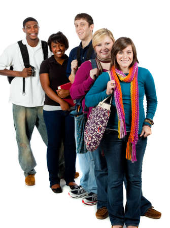 A group of happy multi-racial college students holding backpacks on a white backgroundの写真素材
