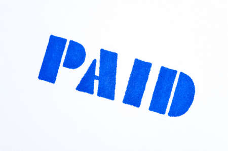 Blue paid stamp on a white backgroundの写真素材