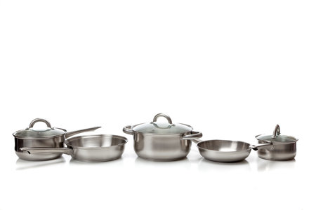A set of stainless steel pots and pans