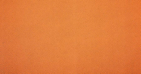 A leather textured basketball backgroundの写真素材