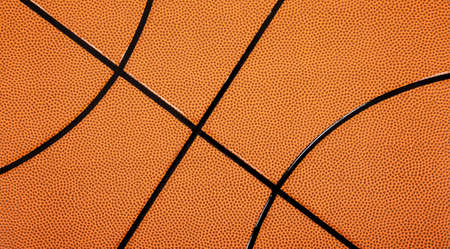 A leather textured basketball backgroundの写真素材