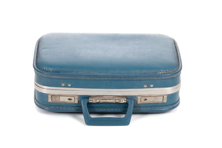 An old blue suitcase on a white backgroundの写真素材