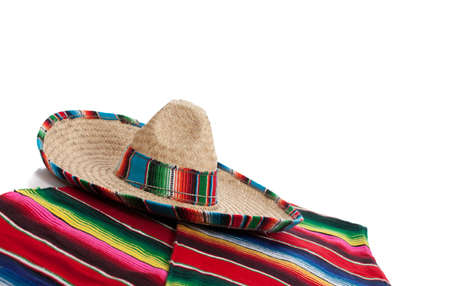 Mexican Serape and a sombrero on a white background with copy spaceの写真素材