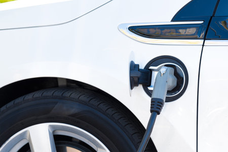 An electric car charging in California