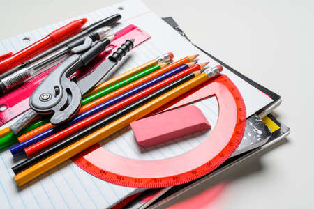 School supplies on a white backgroundの写真素材