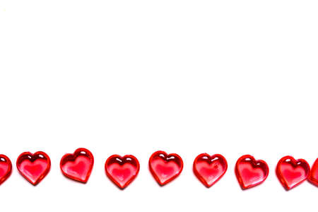 A group of red hearts on a white background with copy space. Valentines day theme.の写真素材