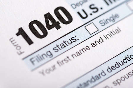 A stack of United States tax forms for individuals.の写真素材