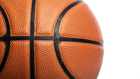 A close-up of a leather basketball on white