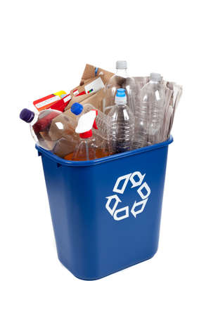 A blue recycle on a white background with plastic bottles and cardboardの写真素材