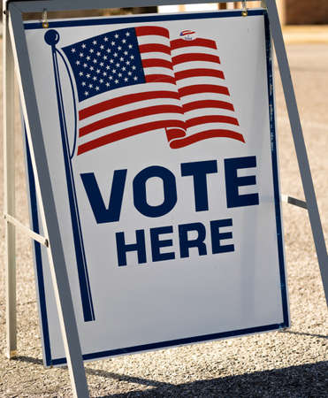 Vote Here sign in a parking lotの写真素材
