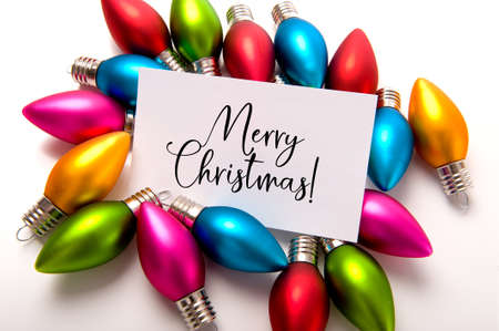 Christmas baubles, ball with note wishing Merry Christmasの写真素材