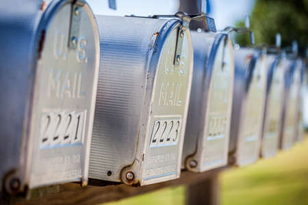 A row of United States mail boxesの写真素材