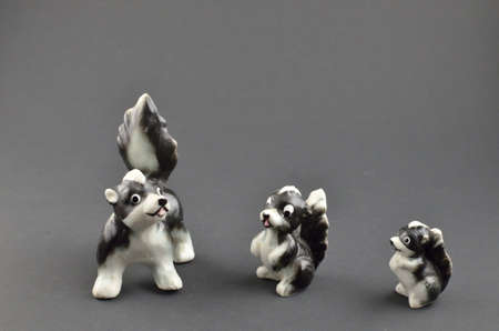 Skunk family antique figurinesの写真素材