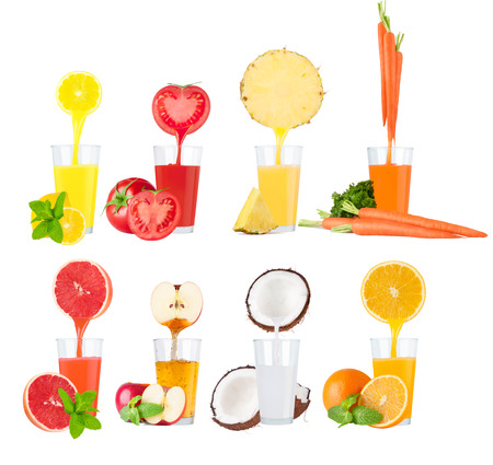 Conceptual image - fresh juice pours from fruits and vegetables in a glass. Photo on a white background.の写真素材