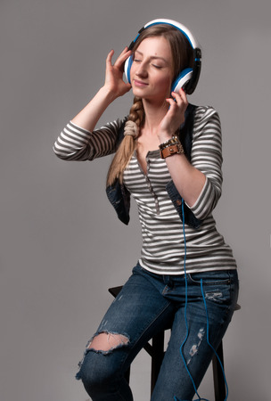 Girl in headphone listen to music, People leisure relax concept.の写真素材