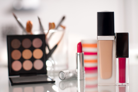 Makeup brush and cosmetics, lipstick, eye shadows, concealer, powder, tools for make-up
の写真素材