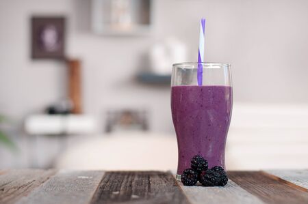 Healthy Eating. Berry smoothies, milkshakes made with fresh blueberries  in a glassの写真素材