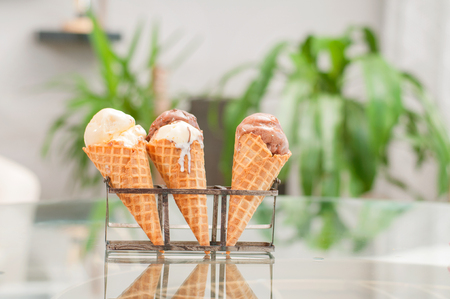 Chocolate and vanilla ice cream cone . Chocolate ice cream in wafer cup.の写真素材