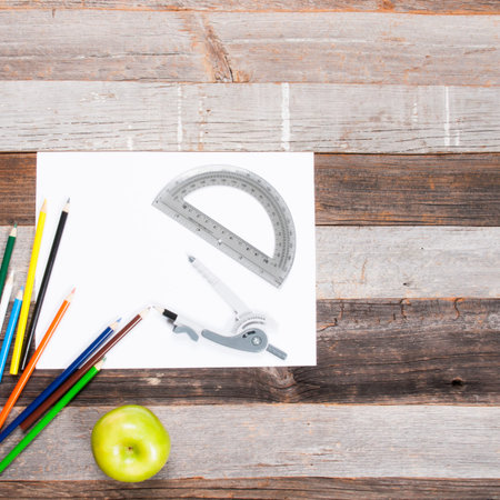 School supplies on wooden background. Back to school