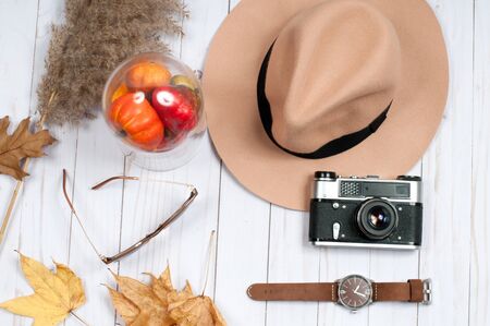 Autumn accessories for women with fall leaves. Fashion clothes. Holidays shoppingの写真素材