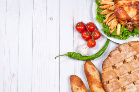 Homemade  roasted whole turkey on wooden table. Thanksgiving Celebration Traditional Dinner Setting Food Conceptの写真素材