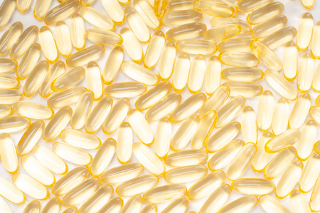 Health care. Fish oil on white backgroundの写真素材