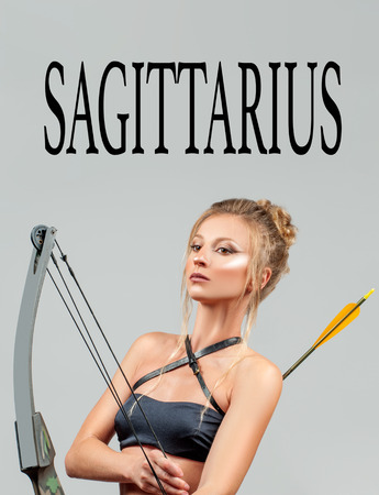 Astrology. Sagittarius Zodiac Sign. Beautiful amazon woman with bow and arrowの写真素材