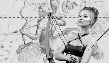 Sagittarius Zodiac Sign. Astrology and horoscope concept, Beautiful woman Sagittarius on zodiac mapの写真素材