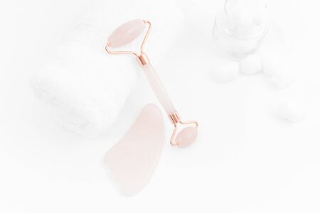 Jade roller for face massage. Jade face roller for beauty facial massage therapyの写真素材