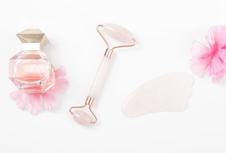 Jade roller for face massage. Jade face roller for beauty facial massage therapyの写真素材