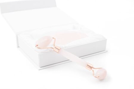 Jade roller for face massage. Jade face roller for beauty facial massage therapy. Guashaの写真素材