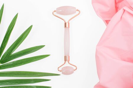 Jade roller for face massage. Jade face roller for beauty facial massage therapyの写真素材